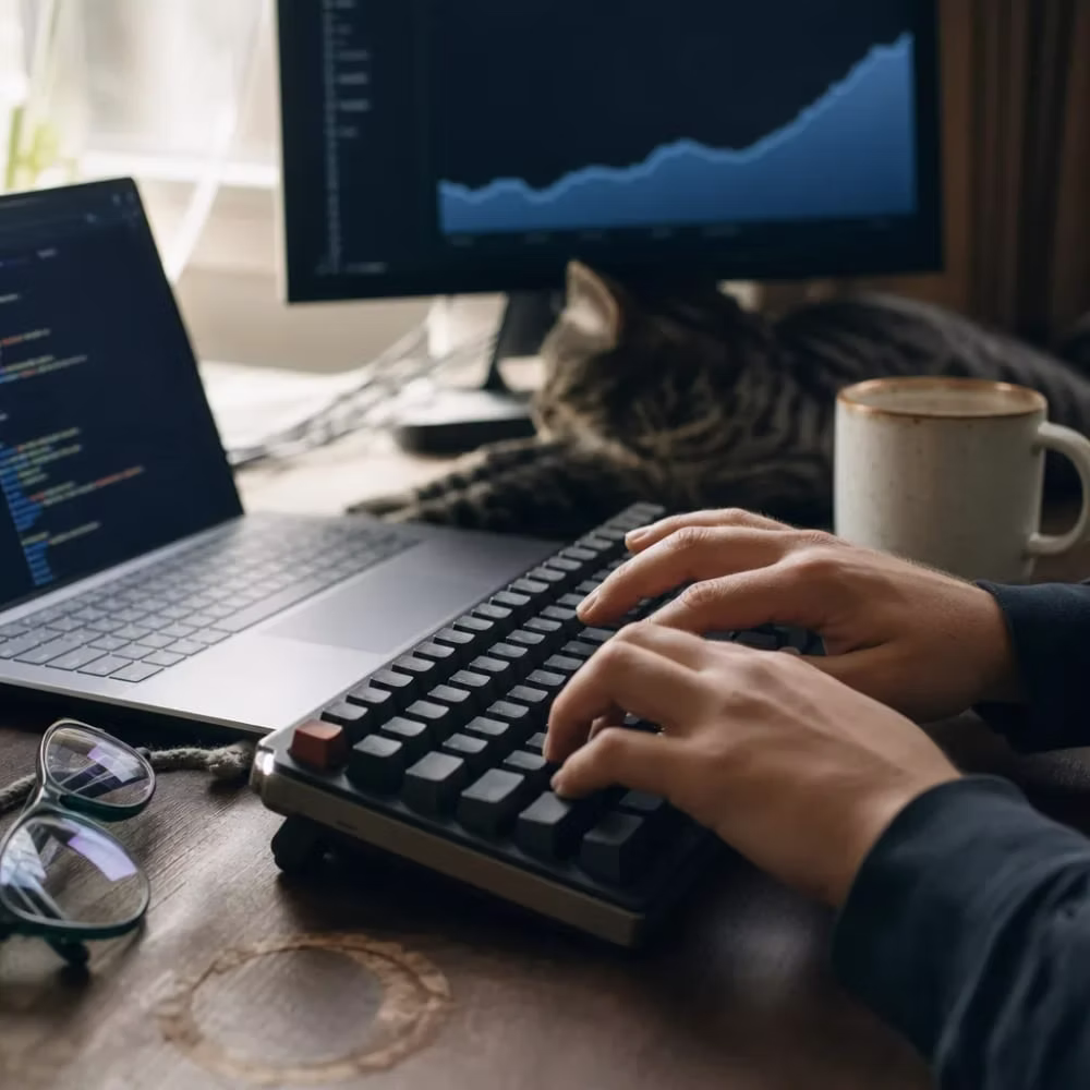 Hands editing an HTML page